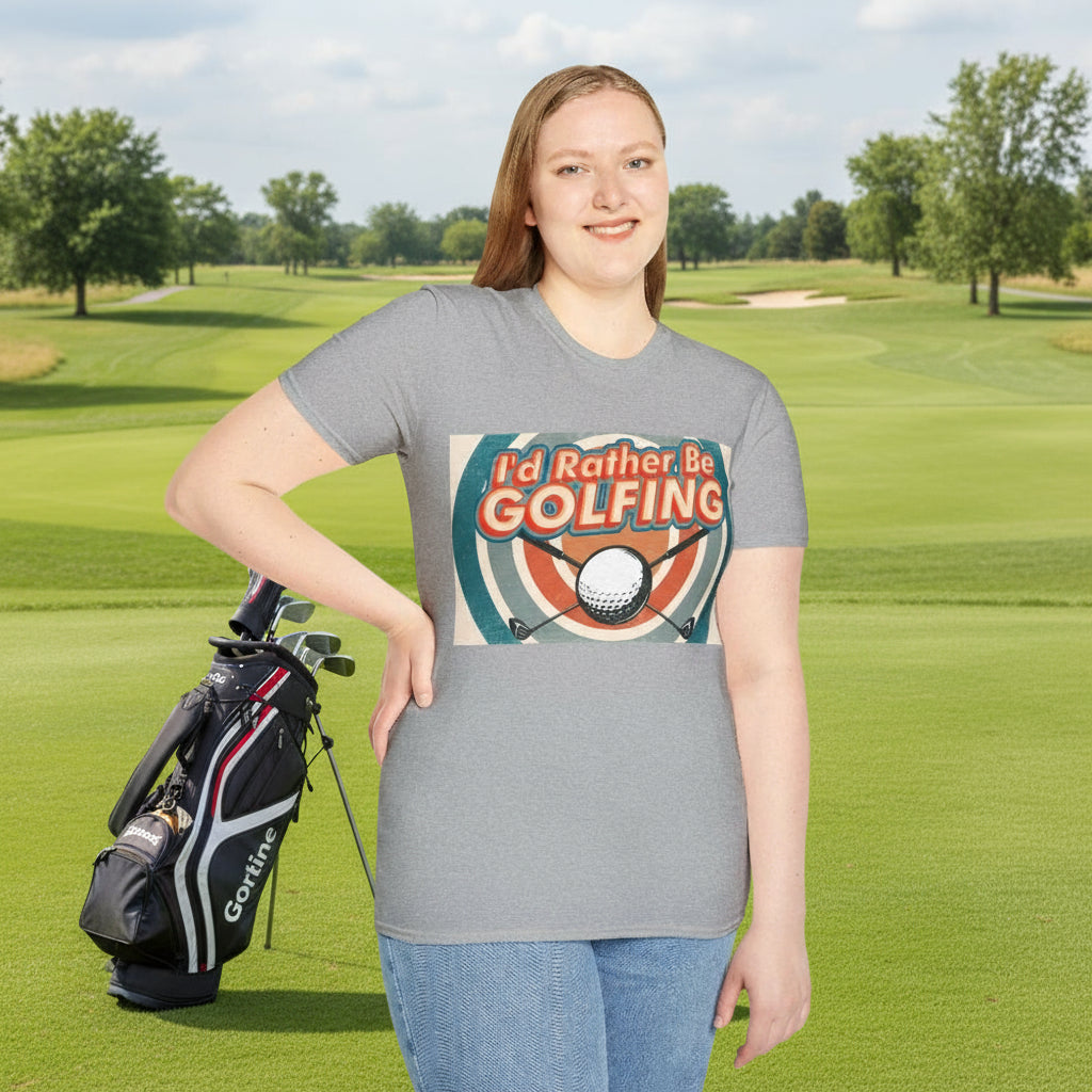 Female wearing a grey t-shirt with 'I'd Rather Be Golfing' graphic design on a golf course.